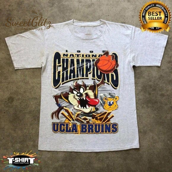 1995 Ucla Bruins Looney Tunes University Of California Los Angeles Football Vintage Ncaa Unisex T-Shirt 1995 Ucla Bruins Looney Tunes University Of California Los Angeles Football Vintage Ncaa Unisex T-Shirt