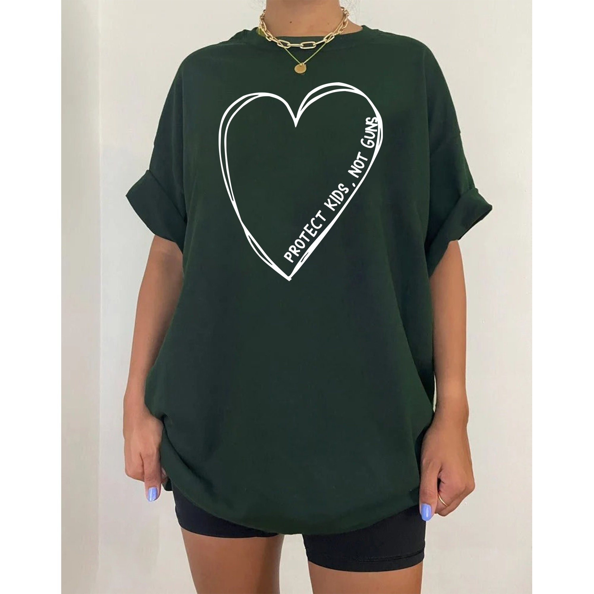 Protect Kids Not Guns Big Heart Unisex T-Shirt Protect Kids Not Guns Big Heart Unisex T-Shirt