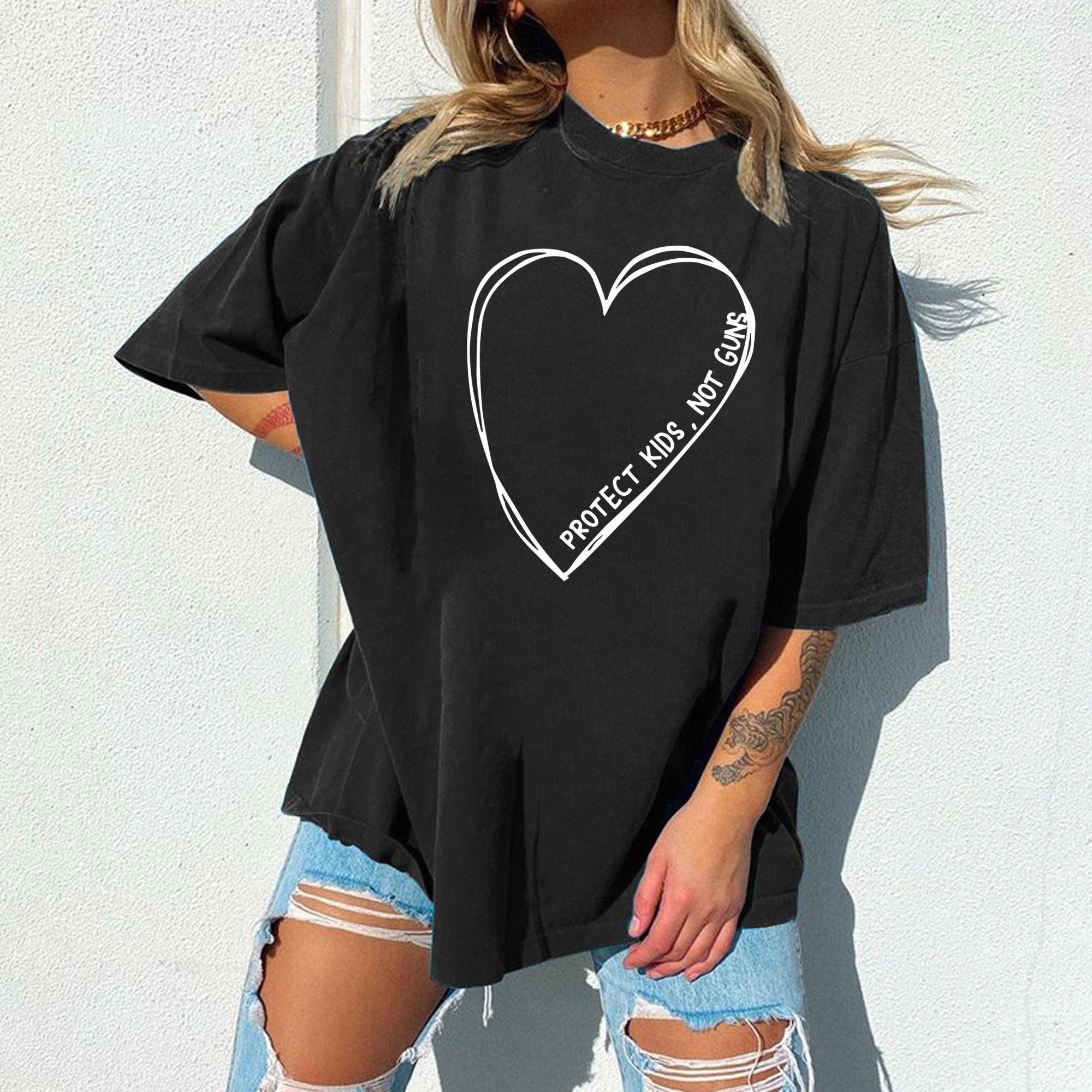 Protect Kids Not Guns Big Heart Unisex T-Shirt Protect Kids Not Guns Big Heart Unisex T-Shirt