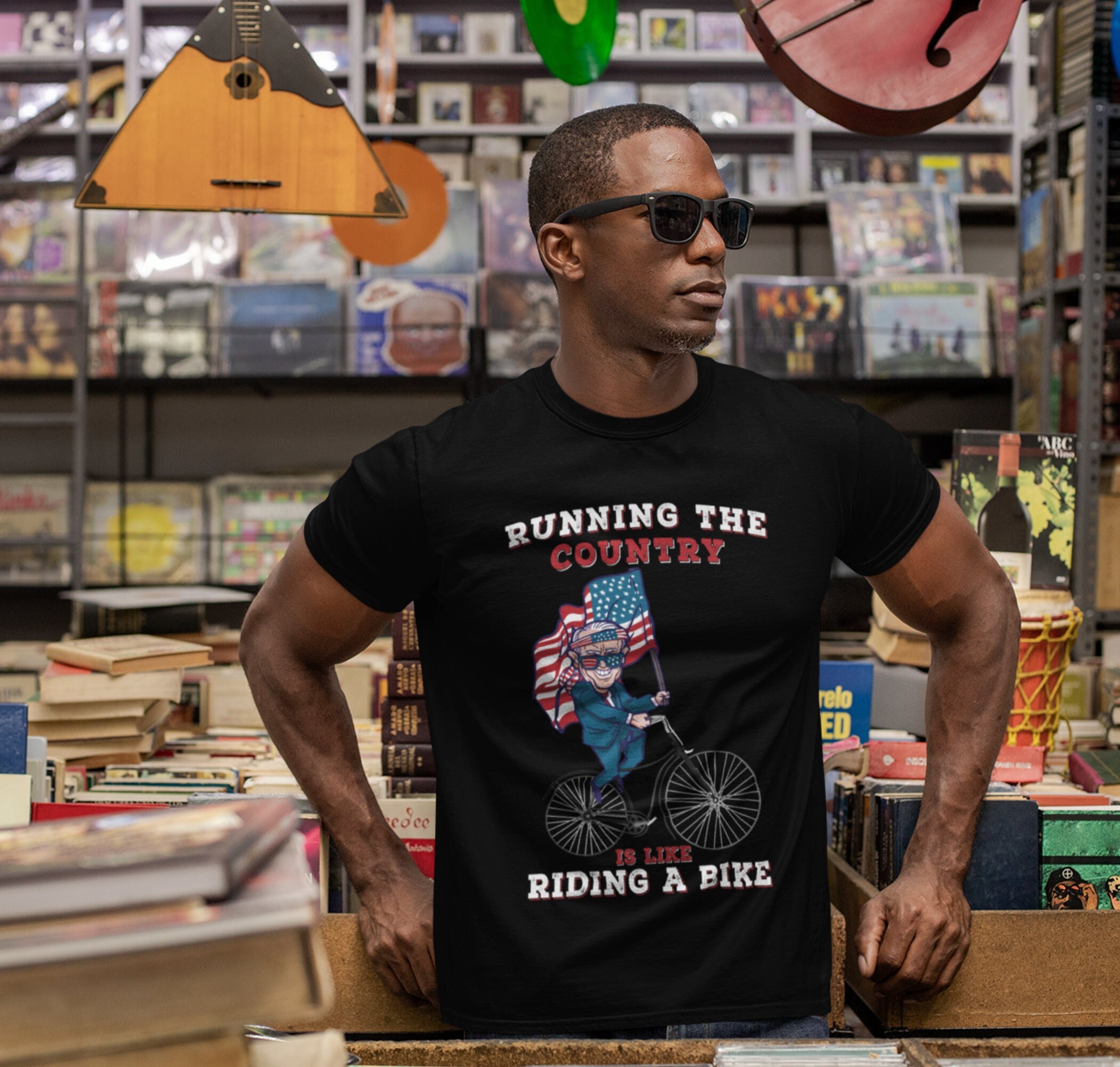 Running The Country Is Like Riding A Bike Anti Biden Unisex T-Shirt Running The Country Is Like Riding A Bike Anti Biden Unisex T-Shirt