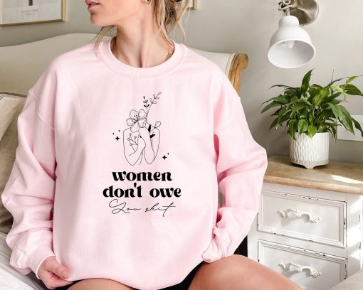 Women Don’t Owe Unisex Sweatshirt