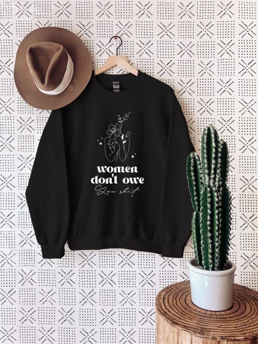 Women Don’t Owe Unisex Sweatshirt