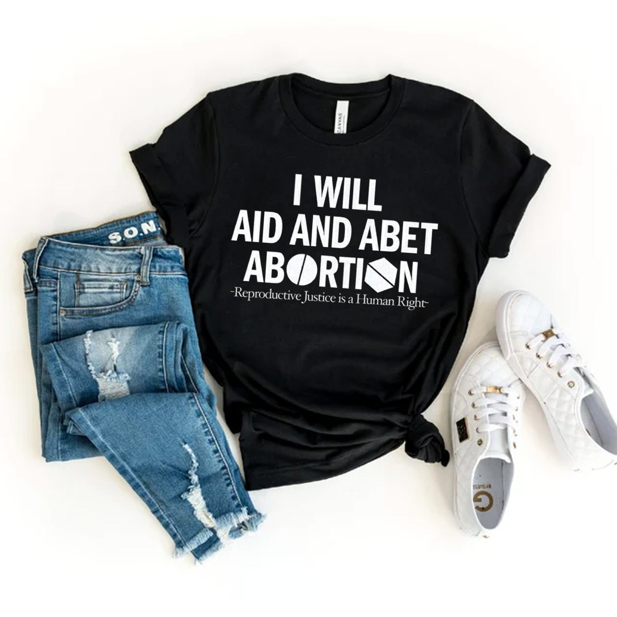 I Will Aid And Abet Abortion Reproductive Justice Is A Human Right Unisex T-Shirt I Will Aid And Abet Abortion Reproductive Justice Is A Human Right Unisex T-Shirt