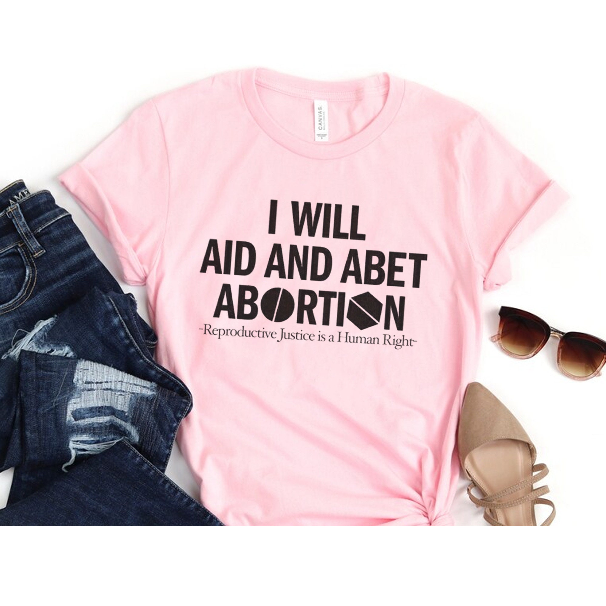 I Will Aid And Abet Abortion Reproductive Justice Is A Human Right Unisex T-Shirt I Will Aid And Abet Abortion Reproductive Justice Is A Human Right Unisex T-Shirt