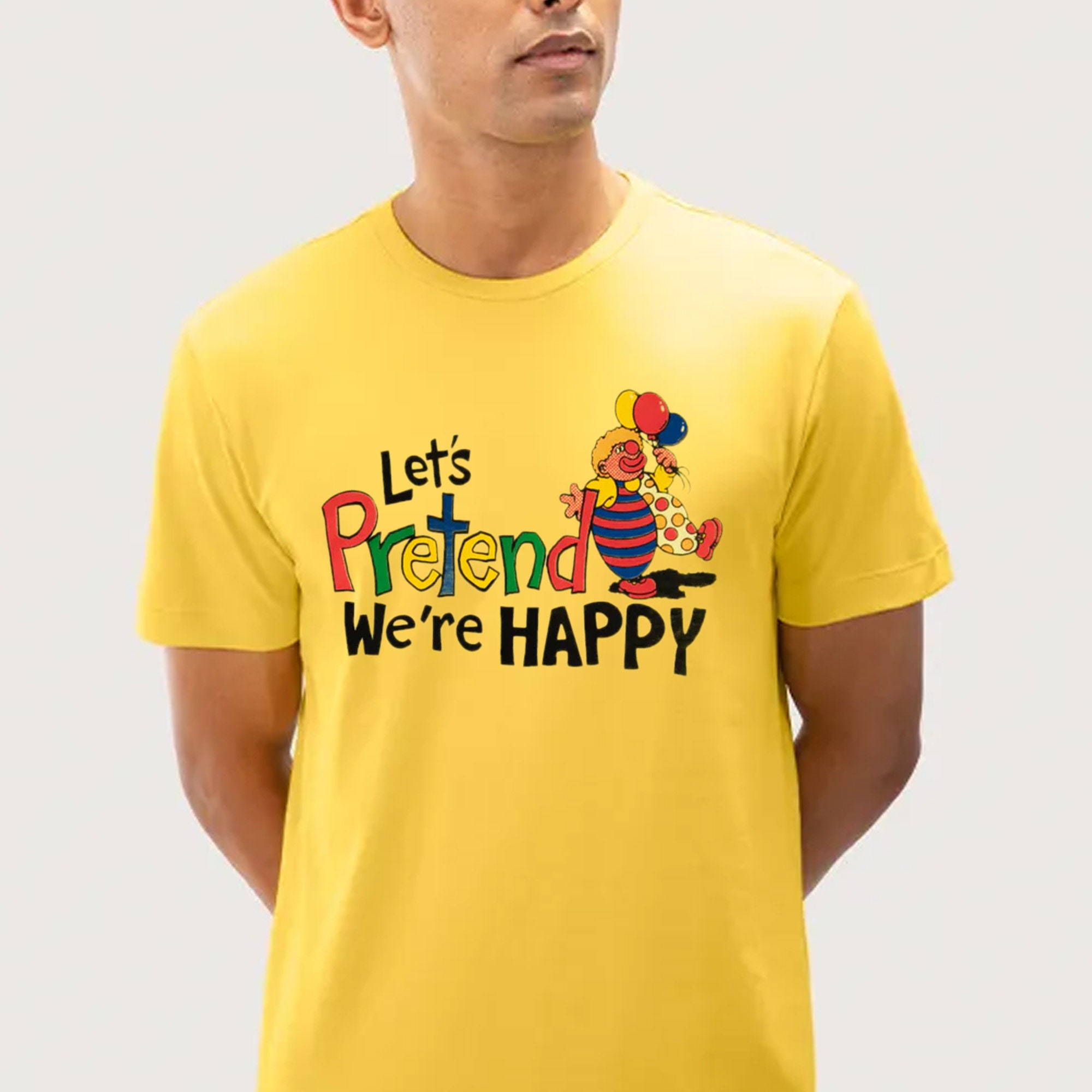 Let's Pretend We're Happy Unisex T-Shirt Let's Pretend We're Happy Unisex T-Shirt