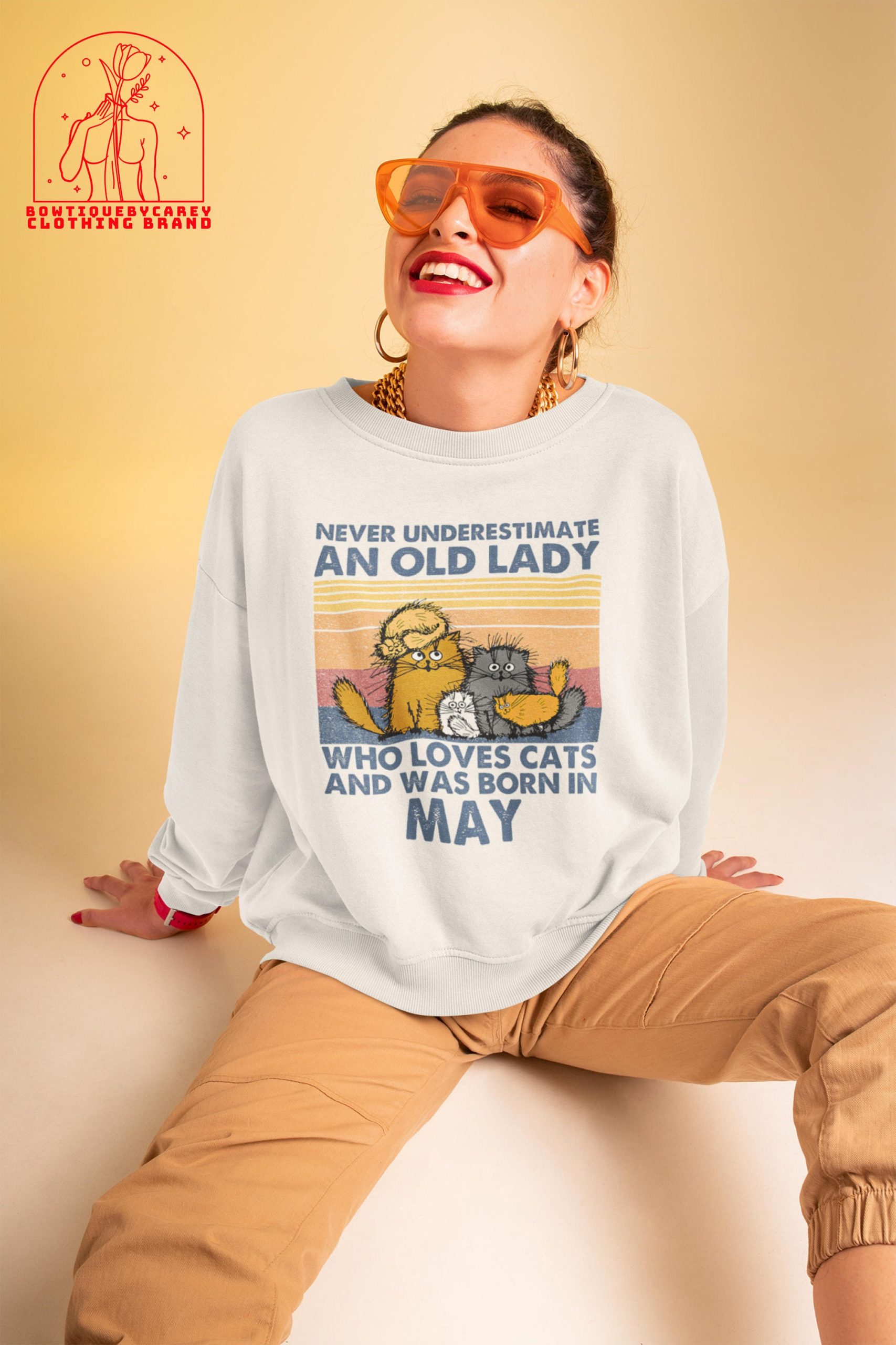 Never Underestimate An Old Lady Who Loves Cats And Was Born In May Unisex T-Shirt Never Underestimate An Old Lady Who Loves Cats And Was Born In May Unisex T-Shirt
