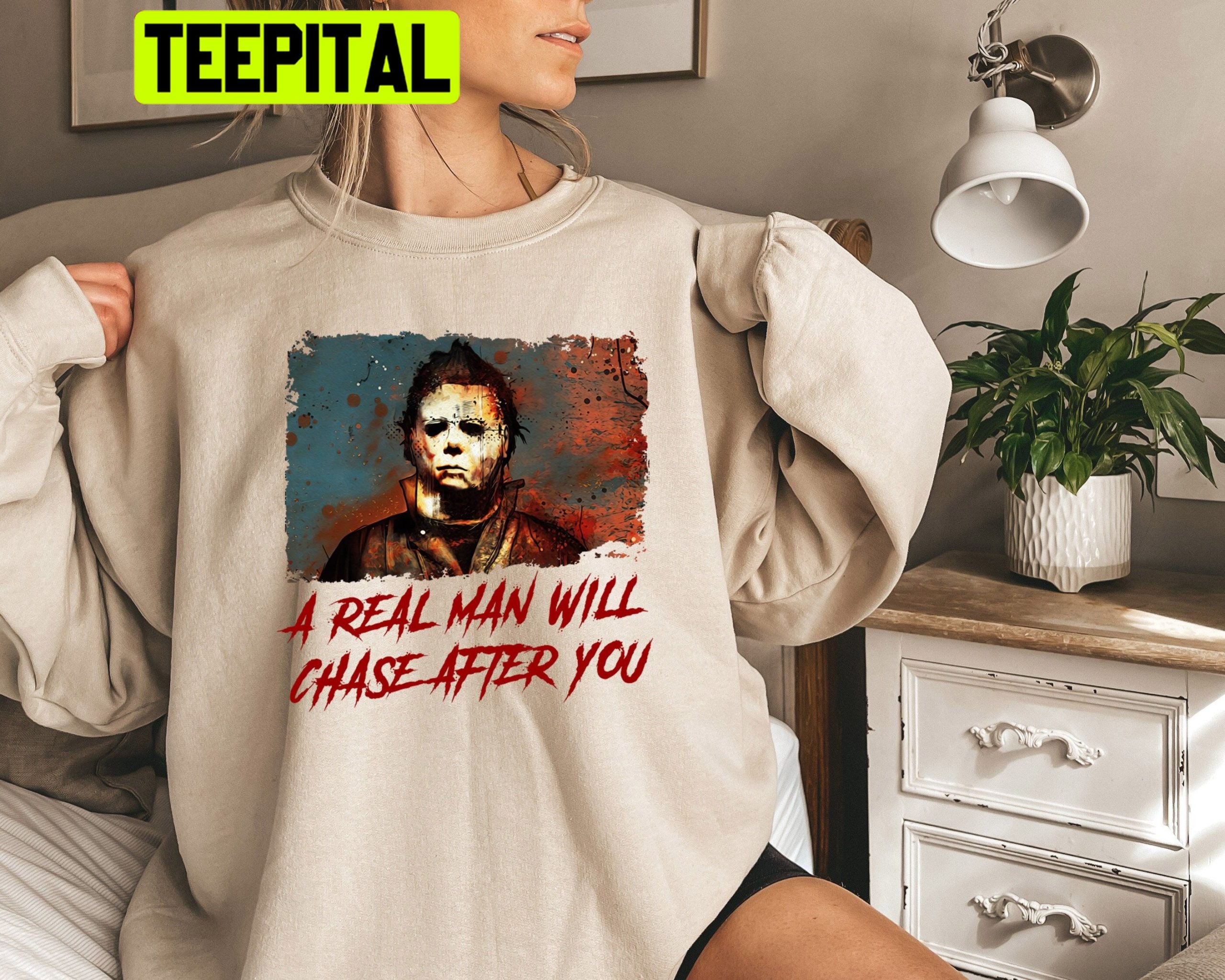 A Real Man Will Chase After You Michael Myers Halloween Trending Unisex Sweatshirt A Real Man Will Chase After You Michael Myers Halloween Trending Unisex Sweatshirt