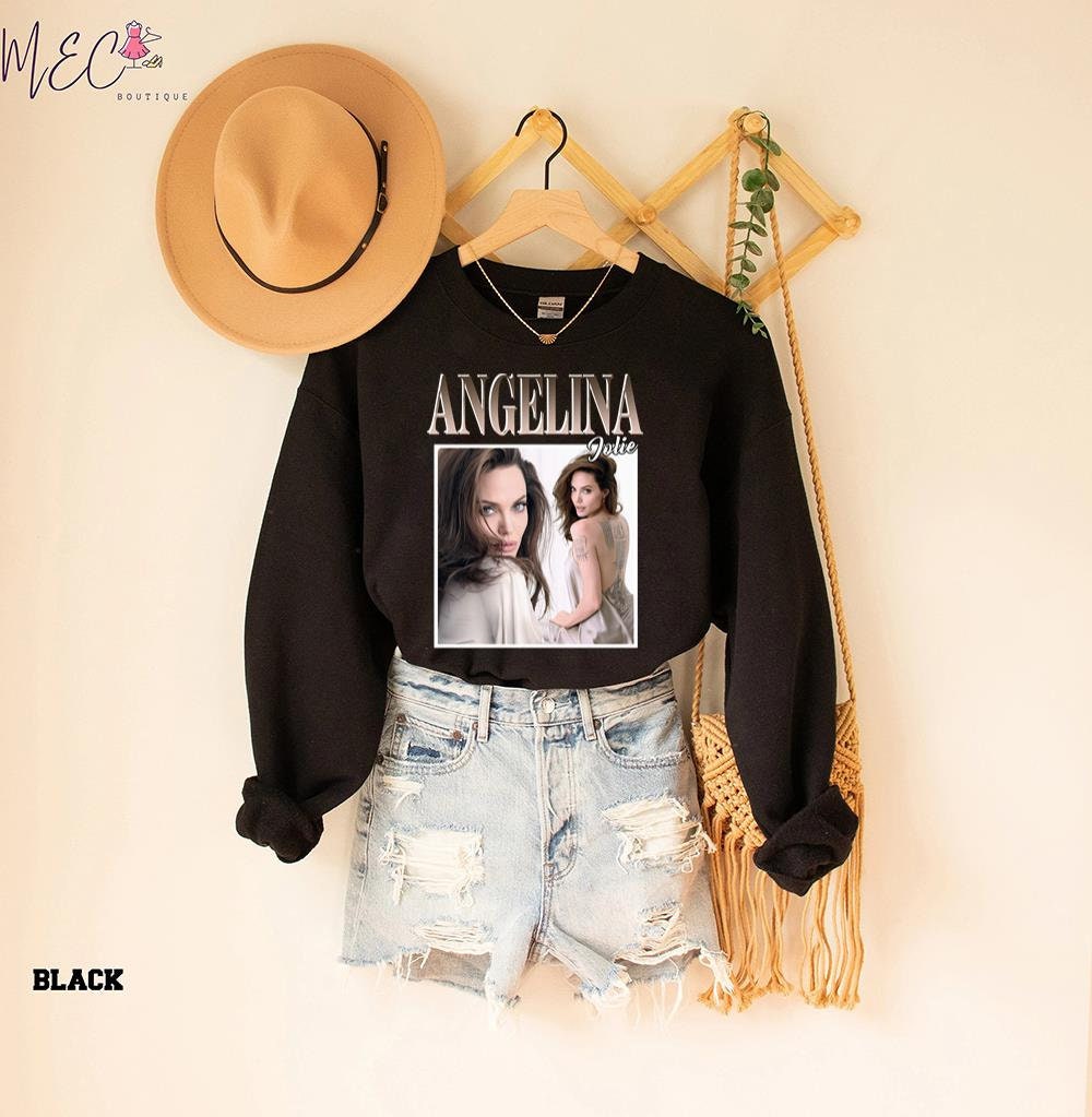 Angelina Jolie Angelina Jolie Angelina Jolie Merch Angelina Jolie 90's Graphic Unisex T-Shirt Angelina Jolie Angelina Jolie Angelina Jolie Merch Angelina Jolie 90's Graphic Unisex T-Shirt
