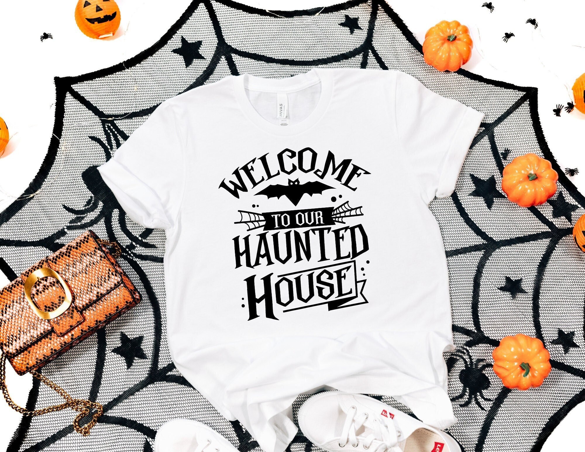 Welcome To Our Haunted House Pumpkin Halloween Unisex T-Shirt Welcome To Our Haunted House Pumpkin Halloween Unisex T-Shirt